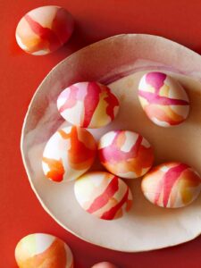 Watercolored Easter Eggs on a plate.