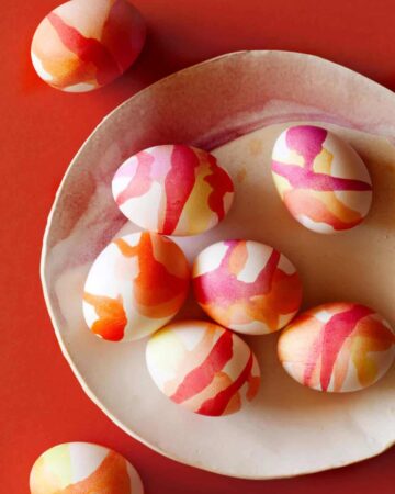 Watercolored Easter Eggs on a plate.