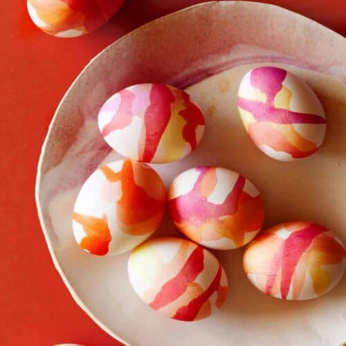 Watercolored Easter Eggs on a plate.