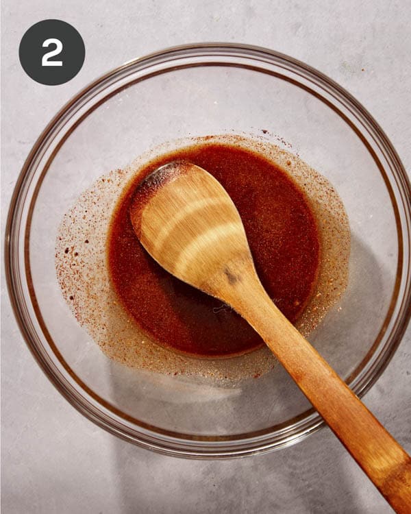Seasoning in a bowl with oil.