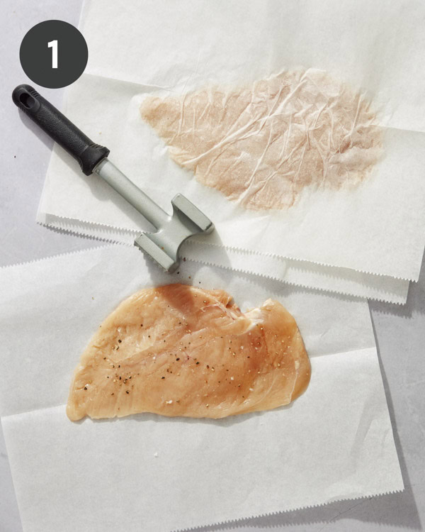 Pounding chicken breasts to make chicken milanese.