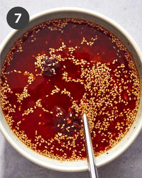 Chili crisp in a bowl marinating.