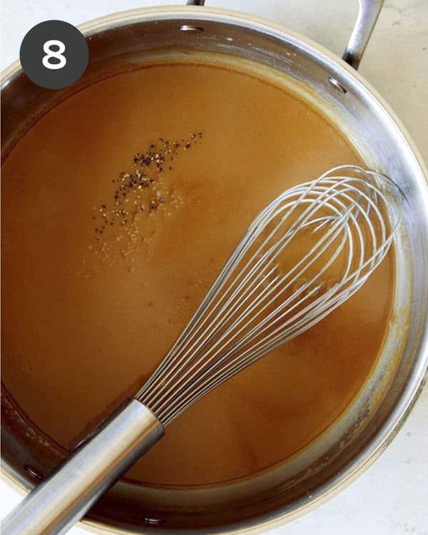 Gravy made in a skillet for Swedish Meatballs with a whisk.
