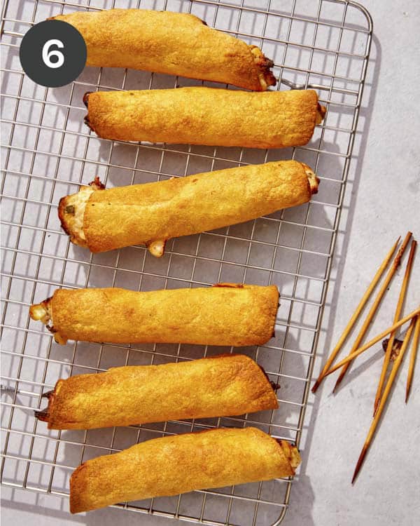 Taquitos out of an air fryer.
