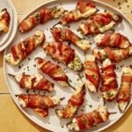 Jalapeno poppers up close on a platter.