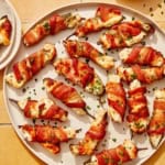 Jalapeno poppers up close on a platter.