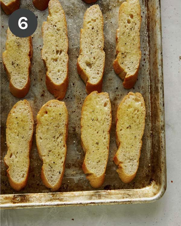 Crostini with butter and olive oil sprinkled with salt and pepper.