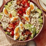 Cobb salad in a bowl freshly made.