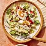 Up close on one serving of cobb salad.