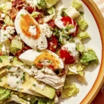 Up close on one serving of cobb salad.