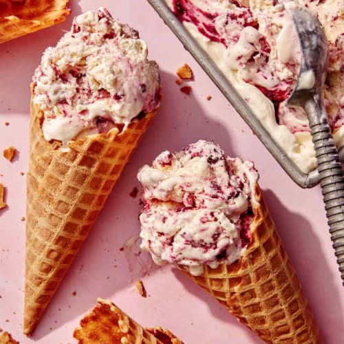 No churn ice cream with waffle cones next to the container.