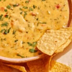 Queso dip with chips in it.