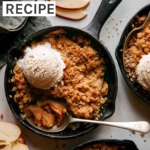 Apple crisp being eaten with ice cream.