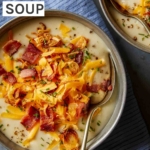 Bowls of loaded baked potato soup with spoons.
