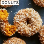 Baked pumpkin donuts with glaze and coconut.