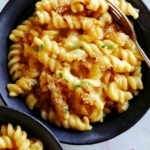 Pumpkin mac and cheese in two bowls.