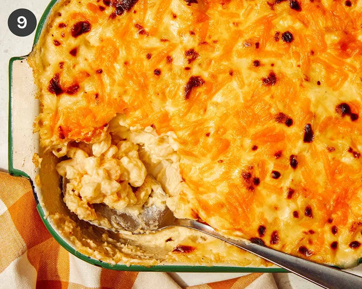 Baked mac and cheese in a dish ready to be served. 