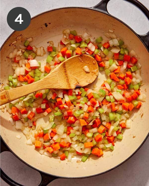 Veggies cooking in a skillet.
