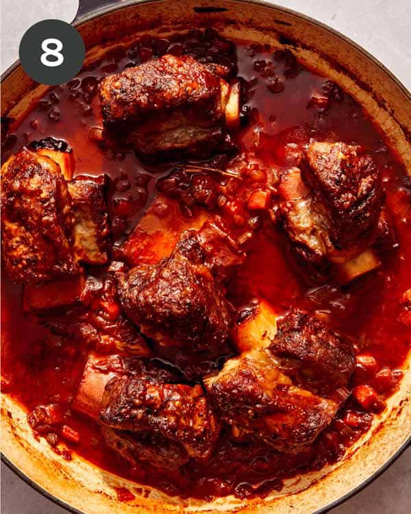 Freshly braised short ribs in a pot.