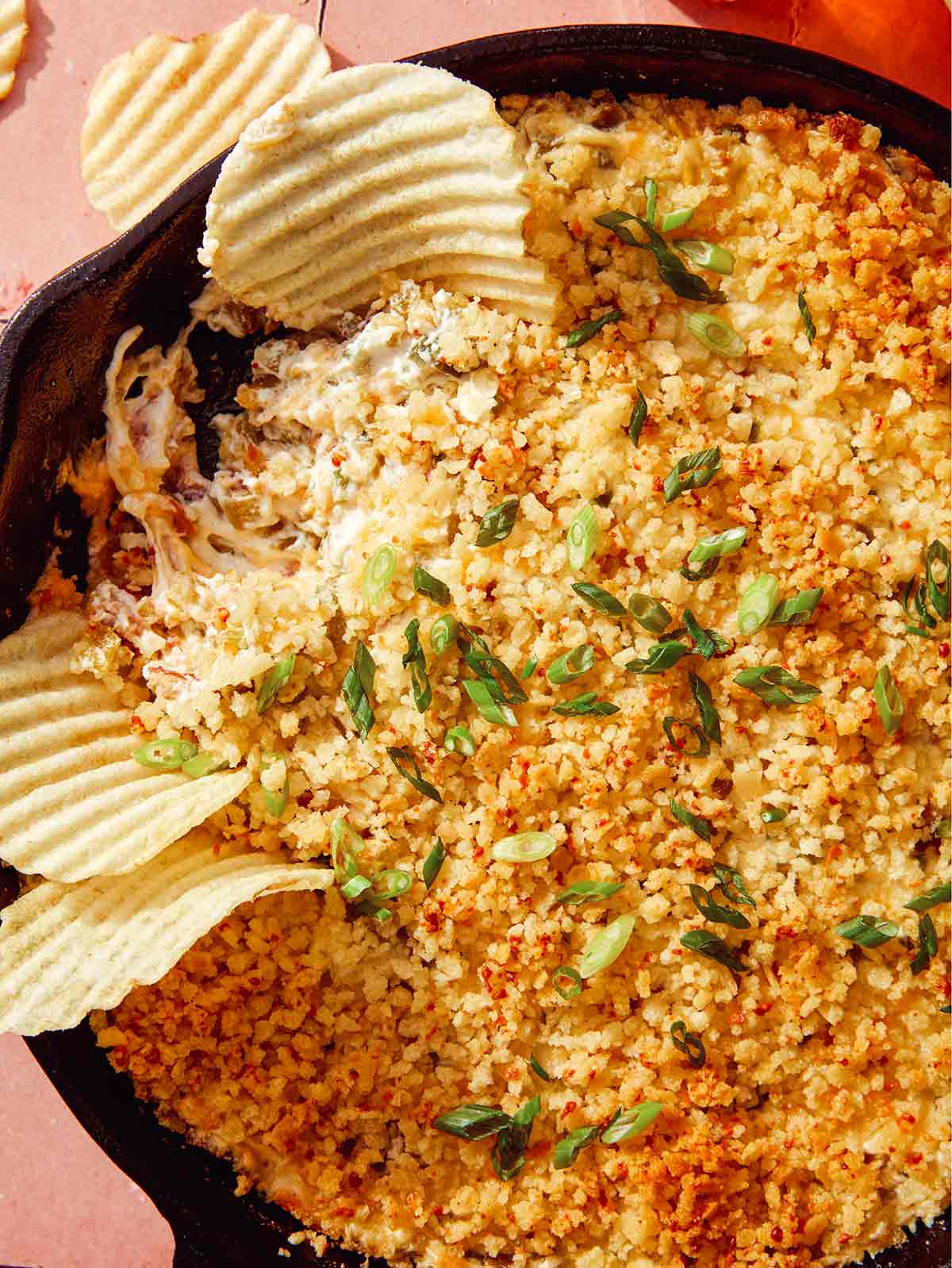 Close up on a skillet full of Jalapeño popper dip.