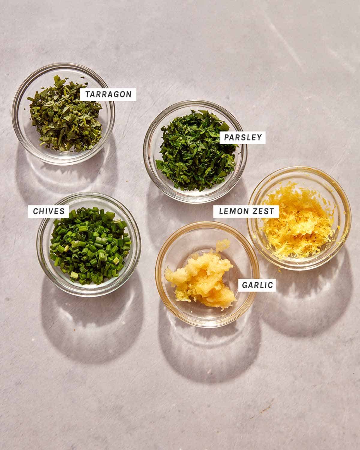 Gremolata ingredients on a kitchen counter for braised short ribs.