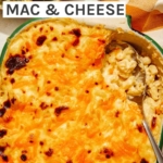 Easy baked mac and cheese in a dish with a spoon in it.