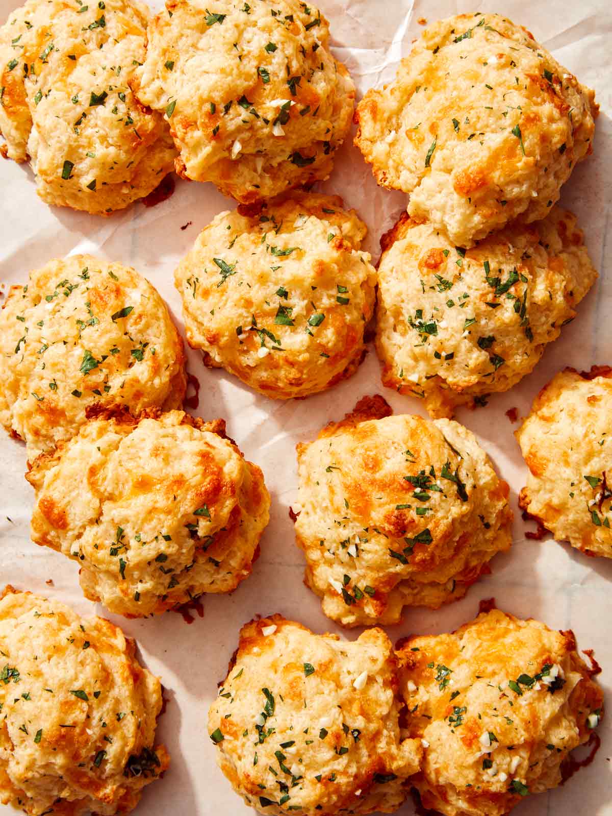 Close up on a finished cheddar bay biscuits made from a recipe.