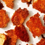 A bunch of parmesan crusted crostini.