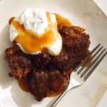 Sticky Toffee pudding recipe in two plates with a fork.