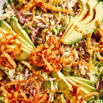 Sesame ginger chicken salad in a big bowl.