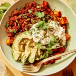 Beef protein bowl up close with a fork in the bowl.