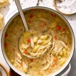 Chicken and gnocchi soup recipe in a pot.