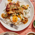 Loco moco recipe card on two plates.