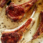 A close up on freshly seared lamb chops so you can see the sear.