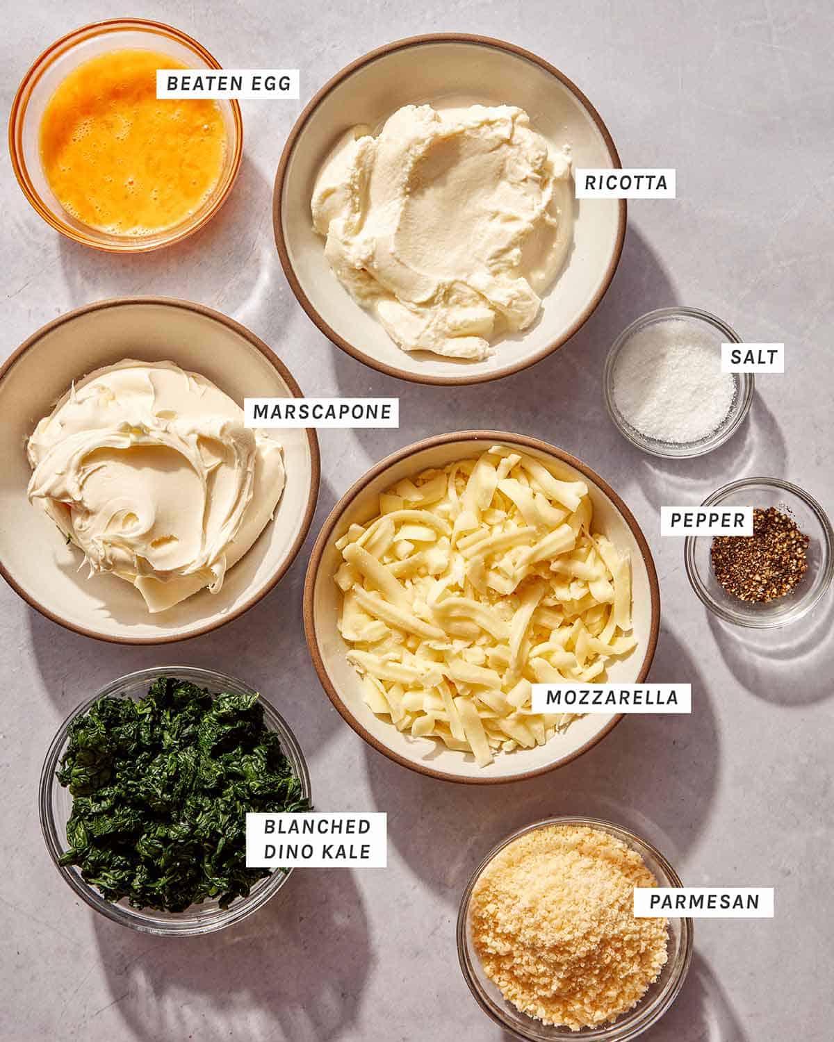 Ingredients for the cheese filling for a lasagna roll ups recipe.