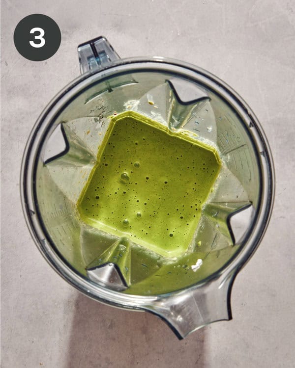 Blended up green sauce in a blender to make Tallarines Verde.