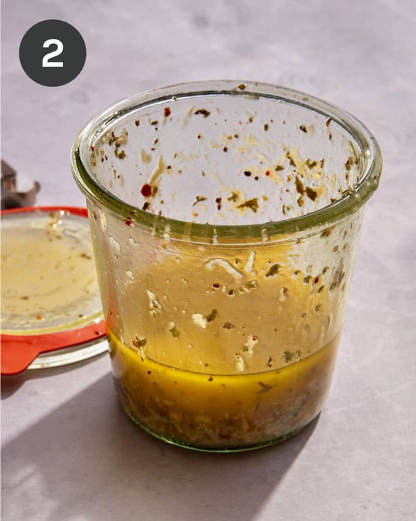 Italian vinaigrette in a jar freshly shaken up.