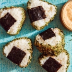 Spicy tuna onigiri on plate.