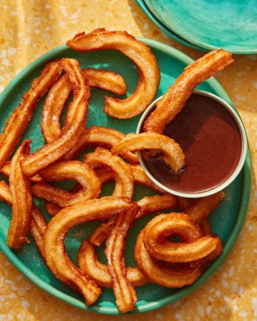 Spanish Churros with chocolate sauce on the side.