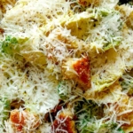 Close up on a platter full of caesar salad.