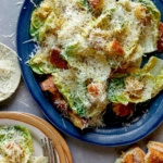 Caesar salad on a platter.