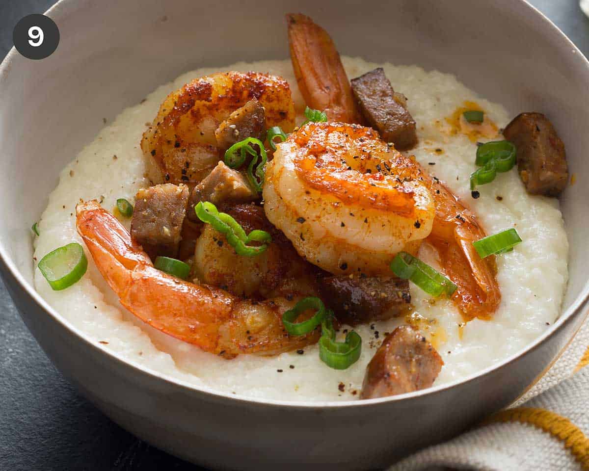 Shrimp and grits plated in a bowl.