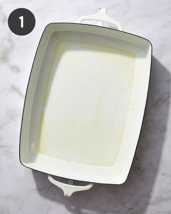 A casserole dish with cooking spray.
