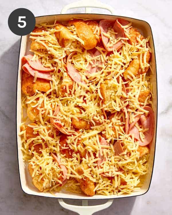 A ham and cheese croissant bake ready for the egg mixture to be poured in.