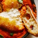Fried burrata over romesco sauce with bread.