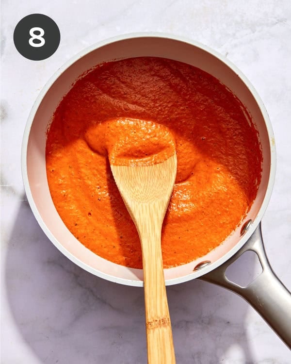 Romesco sauce in a pot simmering.