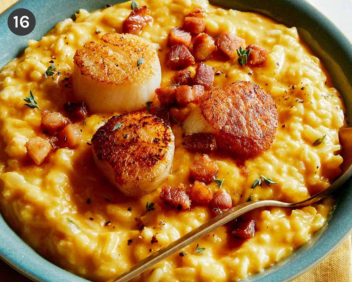 Pumpkin risotto with seared scallops on top.